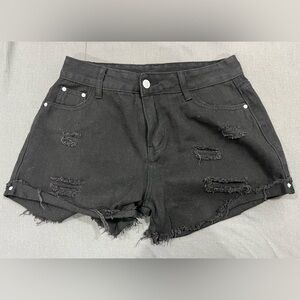 Women's Black Distressed Denim Shorts
88% Cotton
12% Polyesterer
Size 32/ M
